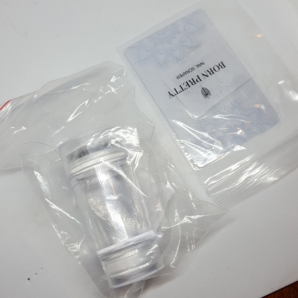 Nail stamper amd scraper